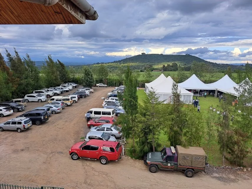 Event grounds with tents and green lawns
